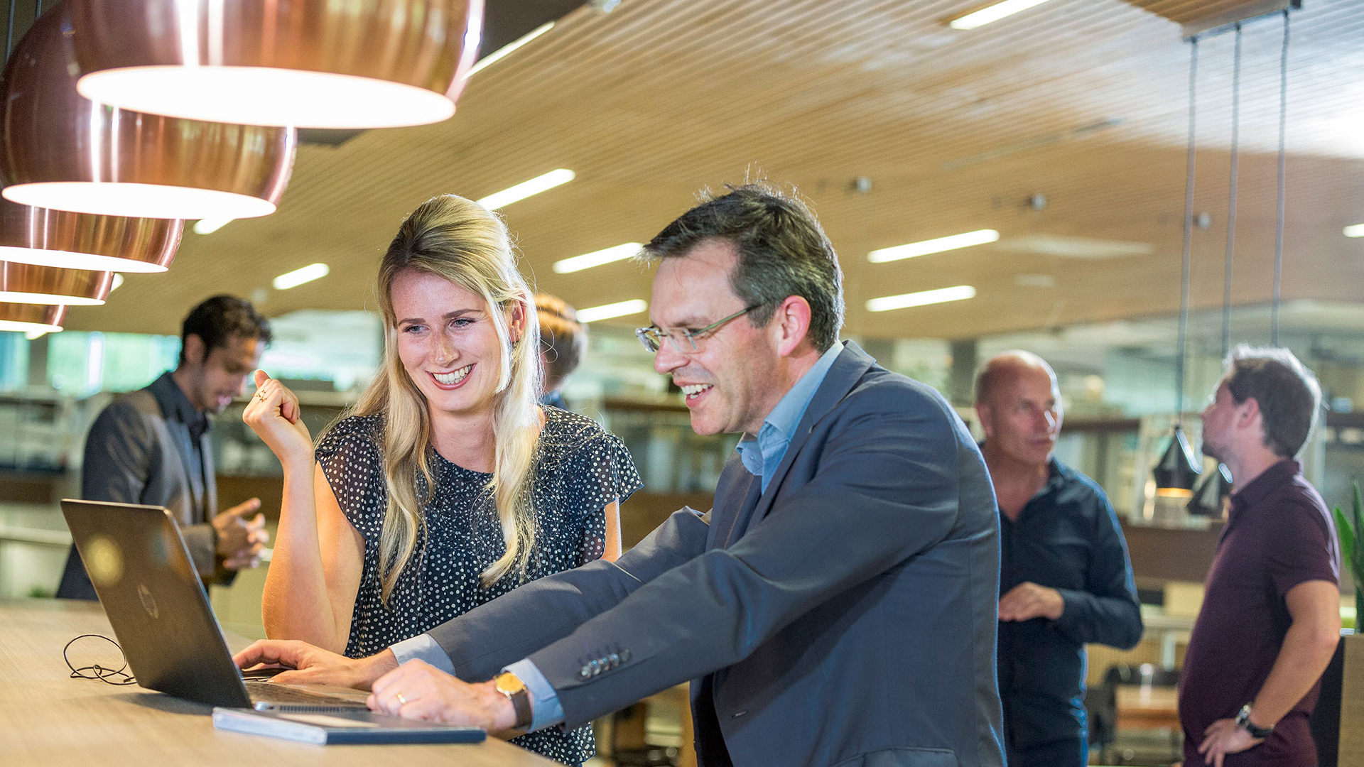 Engineering experts working in an open space in Amersfoort
