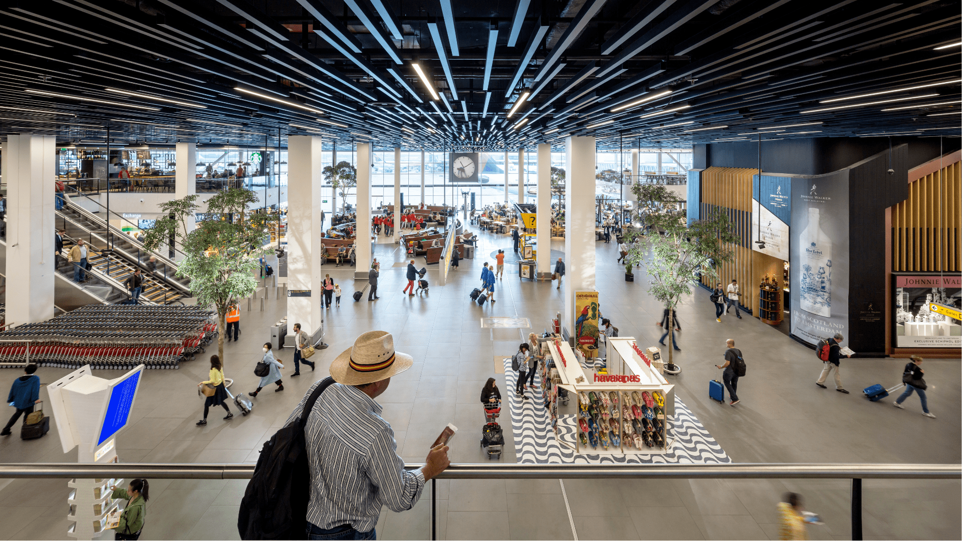 A man looks over an airport terminal