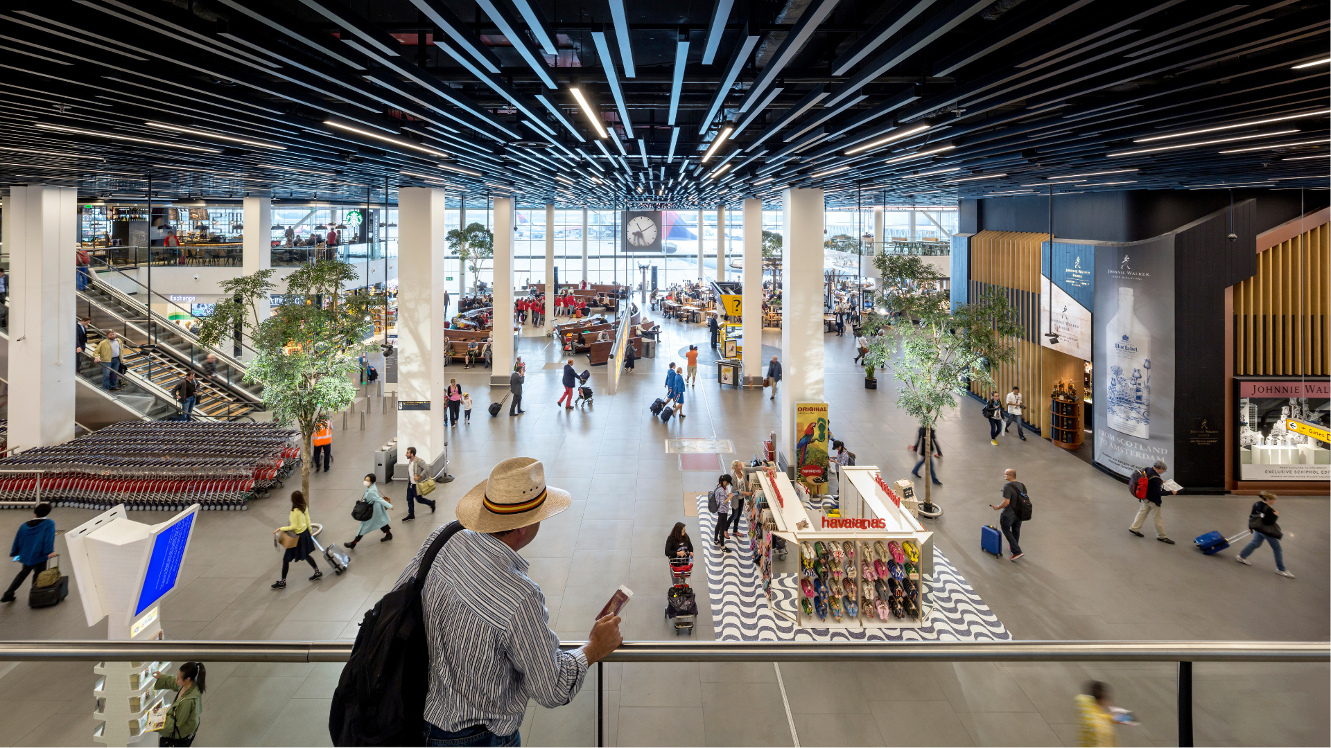 A man looks over an airport terminal