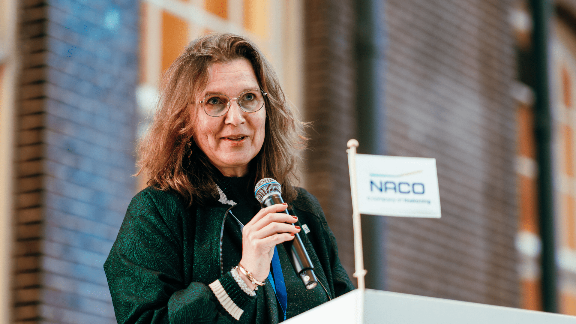 NACO Managing Director, Esther Kromhout, welcomes attendees to the 6th Sustainable Aviation Summit