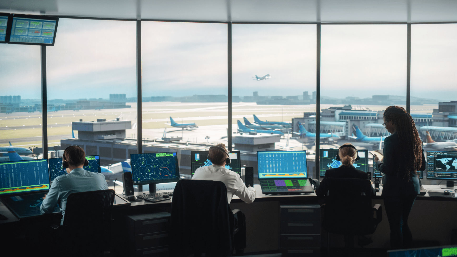 Airport control tower employees working