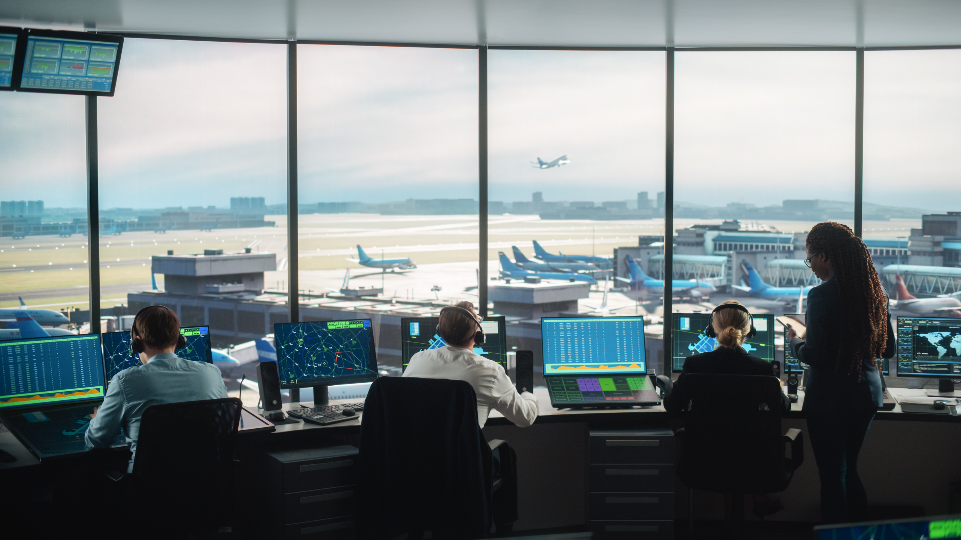 Airport control tower employees working